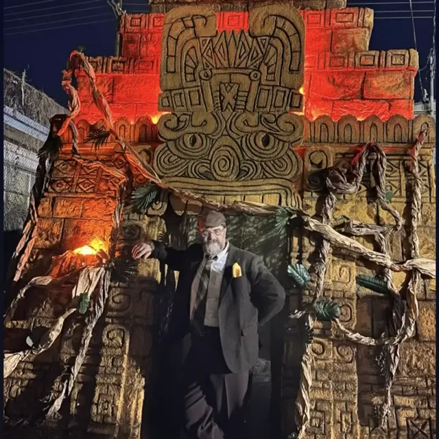 A dad in costume at the Spooktacular temple set